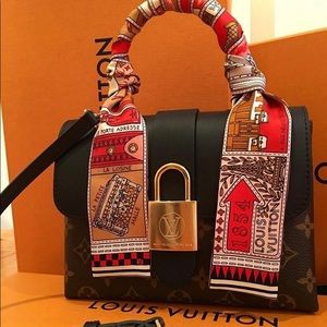 Preloved Louis Vuitton monogram locky bb black